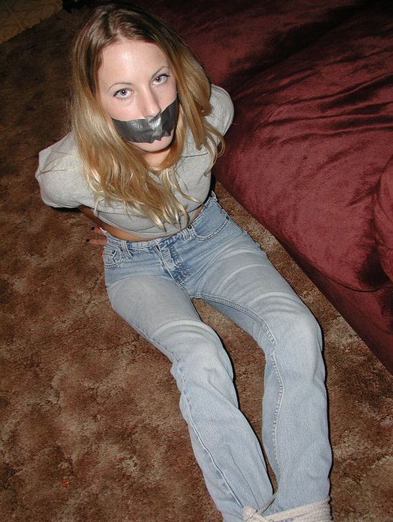 Tied Up And Tape Gagged follando mamando