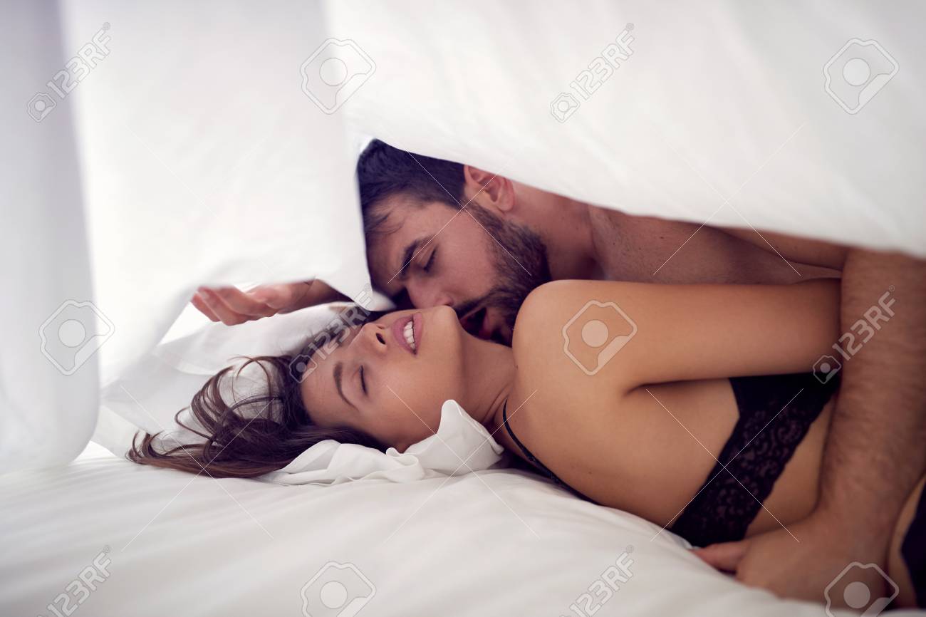 Best of Man and woman making love in bed images