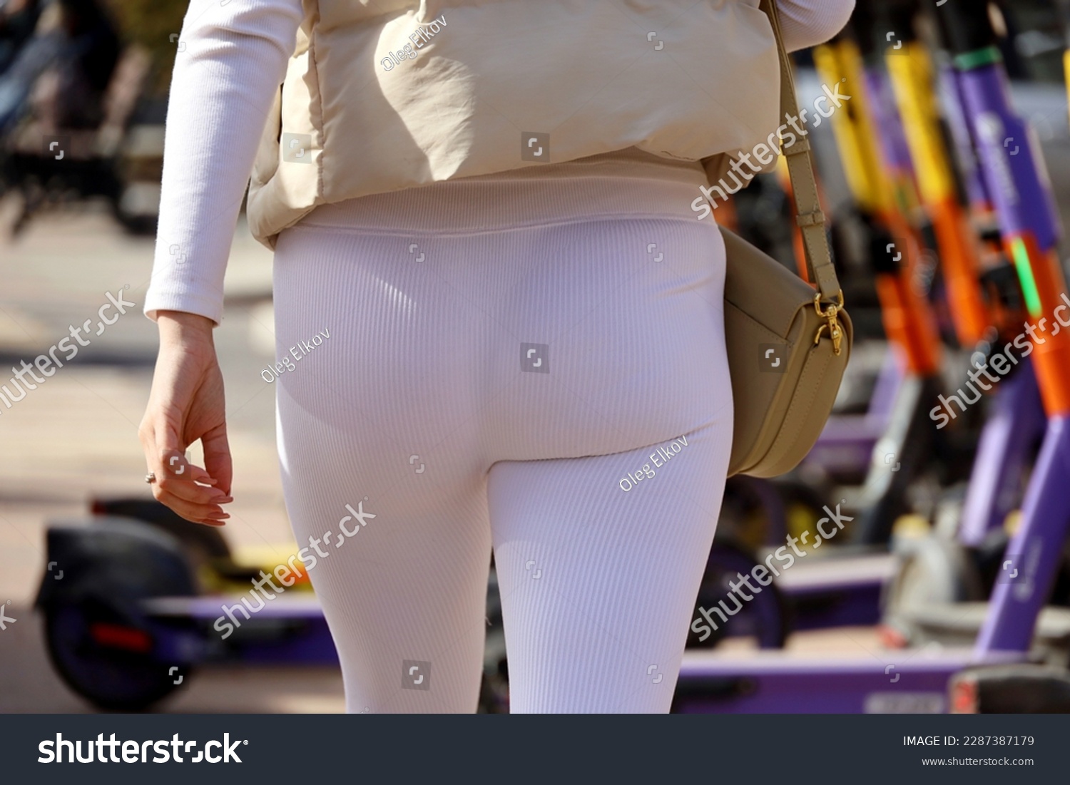 women in tight white pants