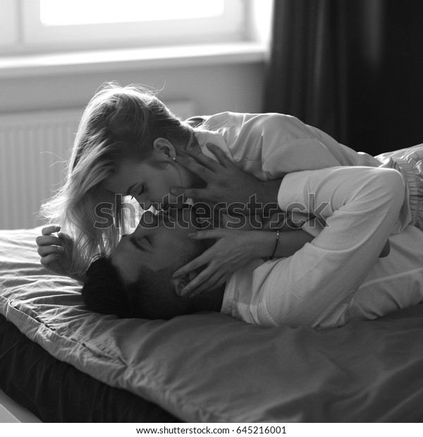 deb christofi add kissing couples romantic in bed photo