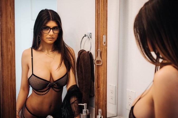 charlie littleton share mia khalifa breast size photos