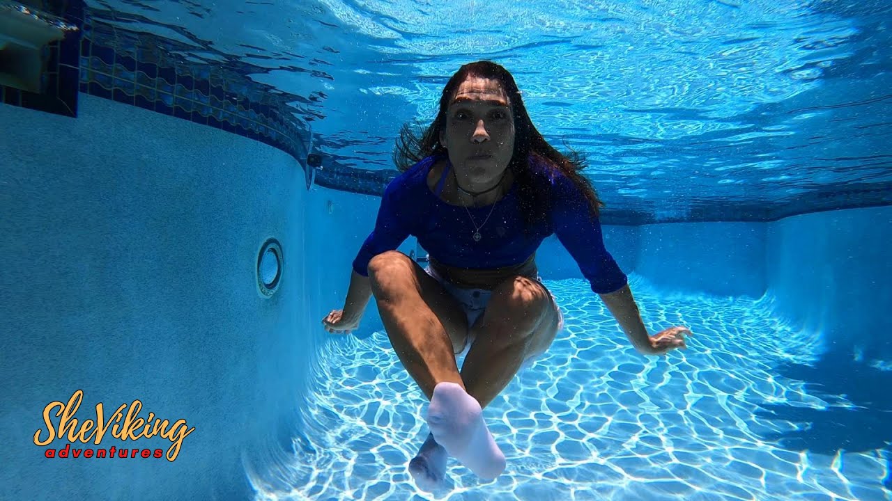 charbel badr add girl swimming under water photo