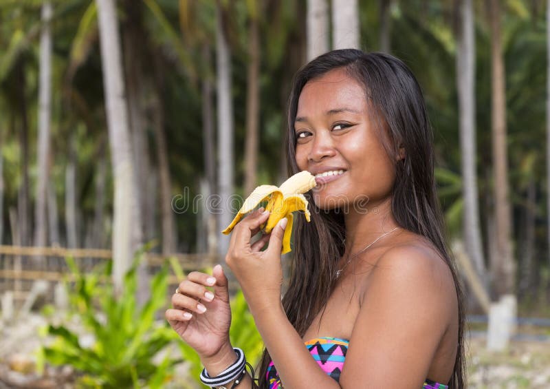 brad rearden recommends woman eating banana picture pic
