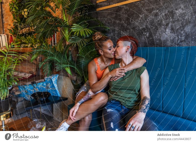 chris peebles add lesbians kissing on couch photo