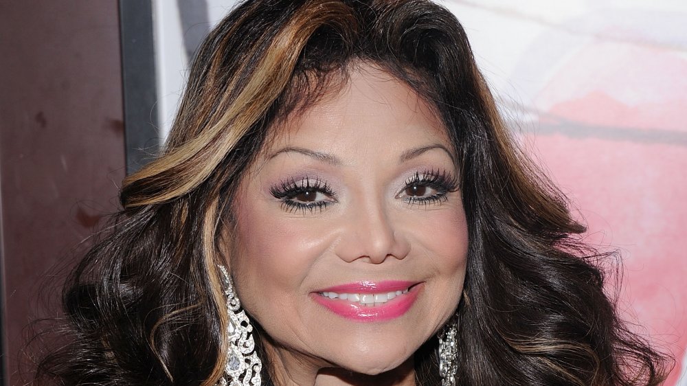 dominique mondor share latoya jackson a cop photos