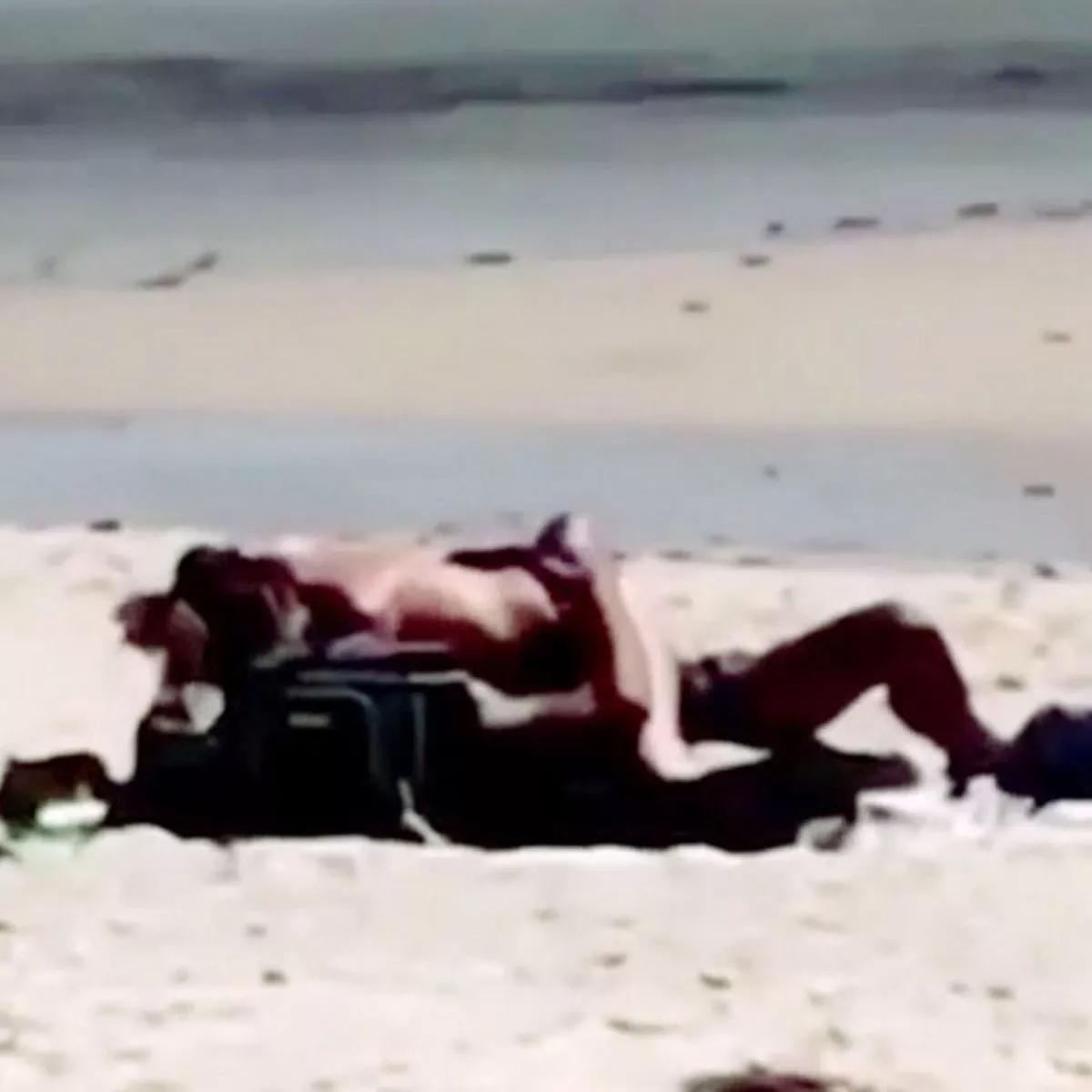 amanda mccallum recommends couple caught on beach pic