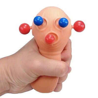 squeeze toy eyes pop out gif