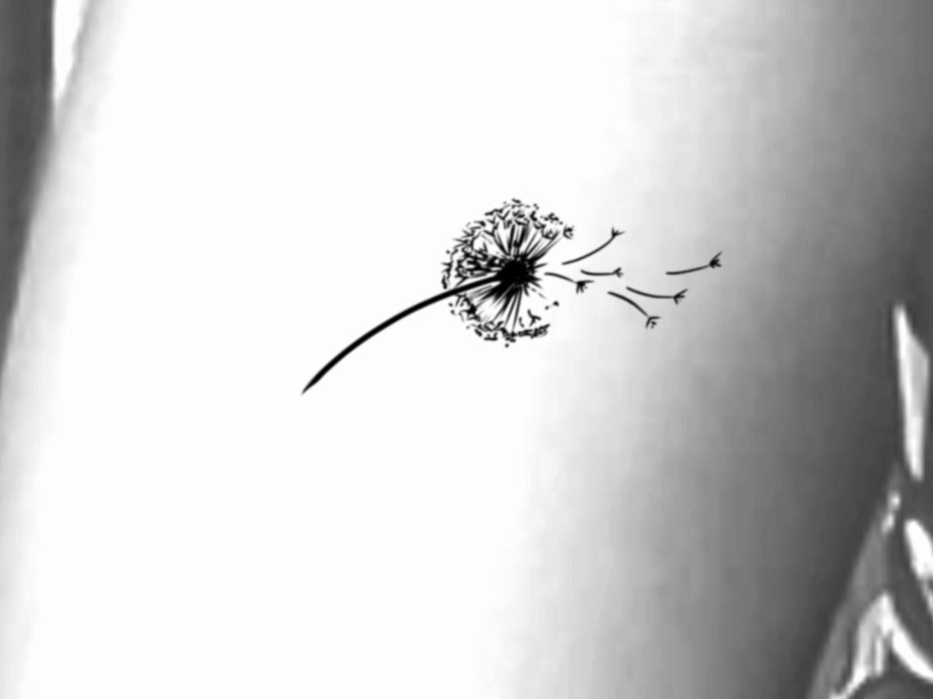 brittni montgomery recommends Flower Blowing In The Wind Tattoo