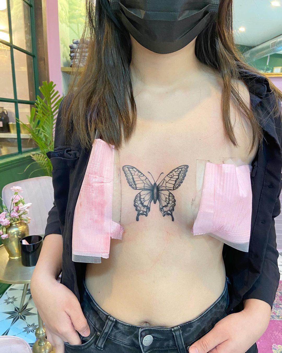 dane johnsen share butterfly sternum tattoo photos