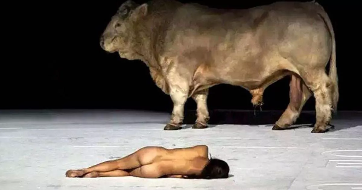 naked woman on bull