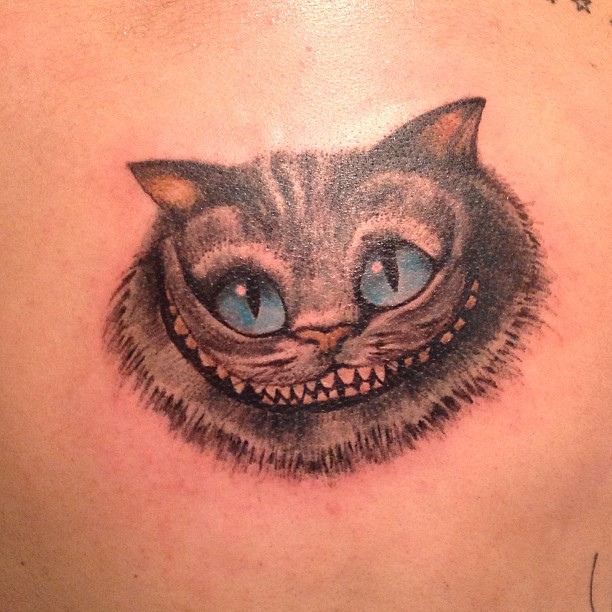 amy riza berba recommends cheshire cat face tattoo pic