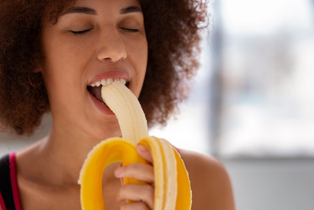 debarshi chakma recommends woman eating banana picture pic