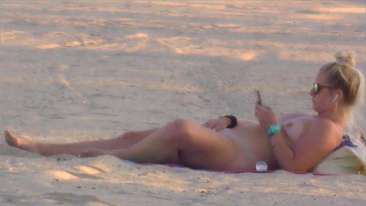 women masturbating on the beach